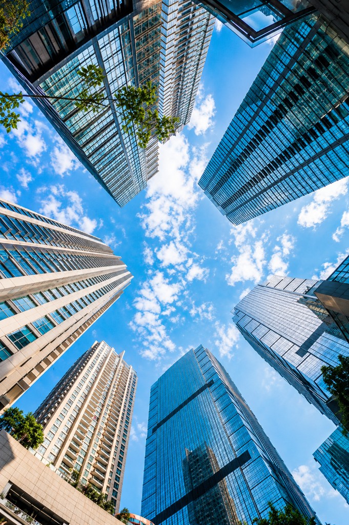 Real estate ERP — modern commercial skyscrapers and urban property development for sales, leasing, and portfolio management in Bahrain and the GCC