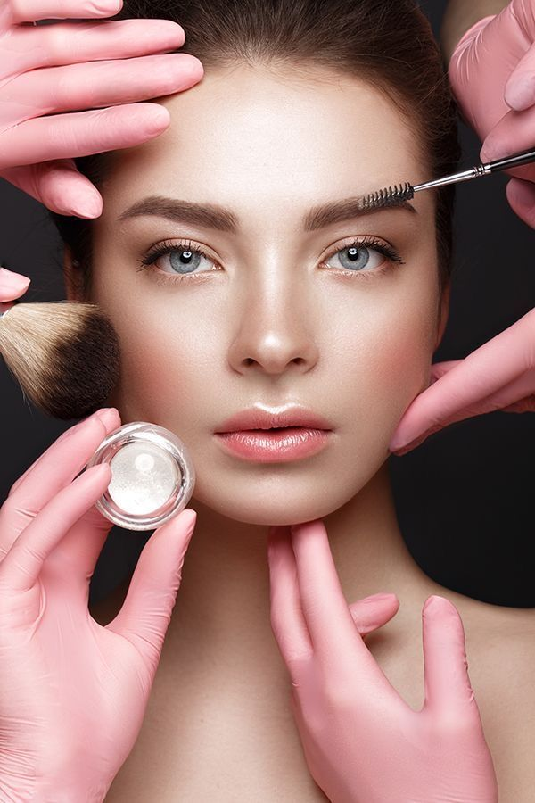 Professional beauty and aesthetic service specialists providing client care