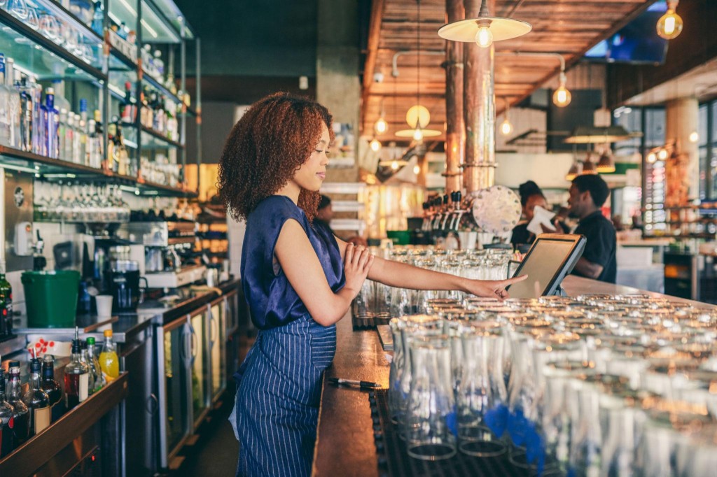 Diamond Point of Sale � staff using touchscreen POS at a retail counter