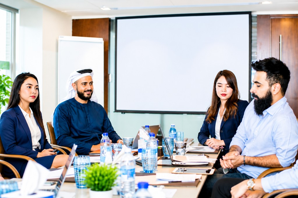 Boost productivity � diverse business team collaborating in a modern meeting room